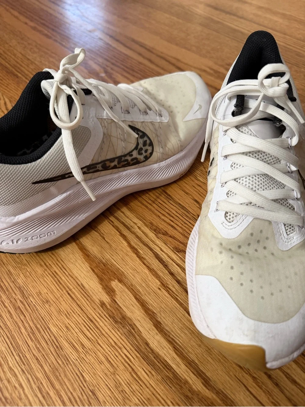 Nike Women’s White Athletic Sneakers with Leopard-Print Swoosh